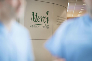 Mercy Logo in Distance